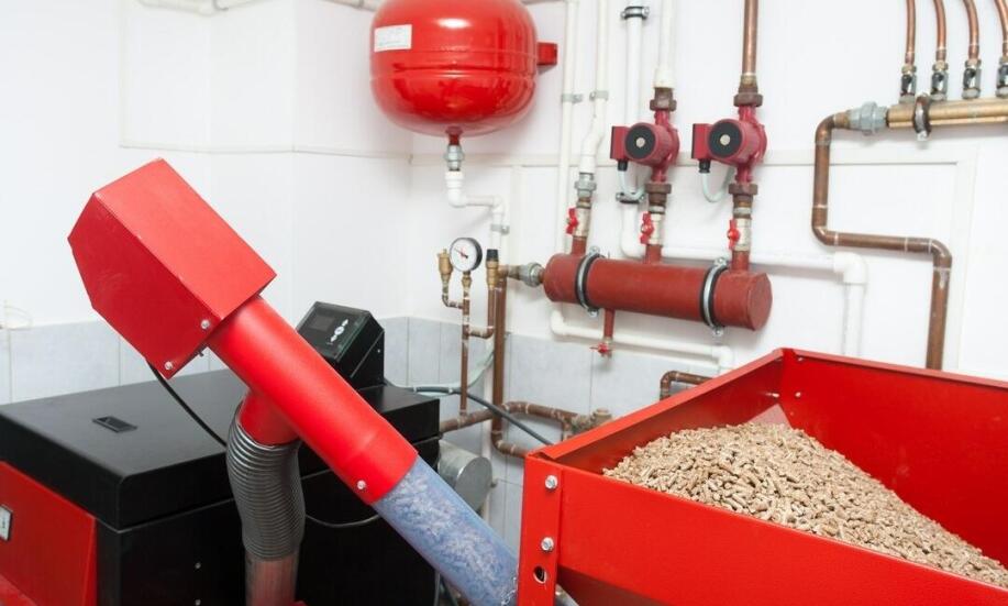 Do czego służy motoreduktor podajnika pelletu?