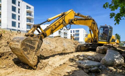 Specjalistyczne usługi koparko-ładowarką w projektach infrastrukturalnych