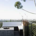 Integracja metalowych barierek z zielonymi przestrzeniami wokół domu