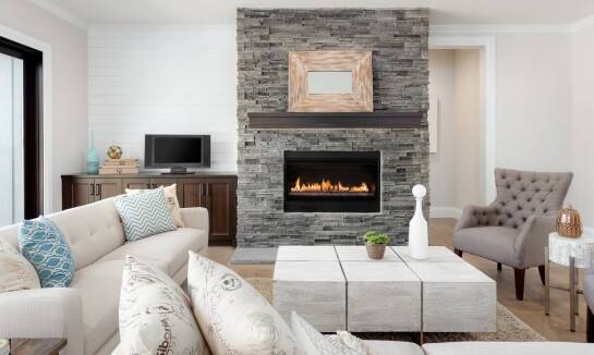 Jakie materiały są najczęściej wybierane na kominki w ofercie kamieniarza?