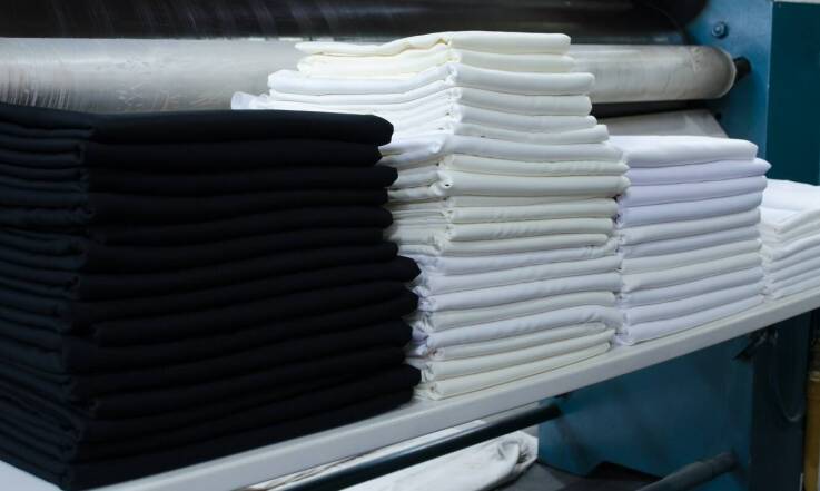 Pranie odzieży roboczej a oszczędność czasu dla firm