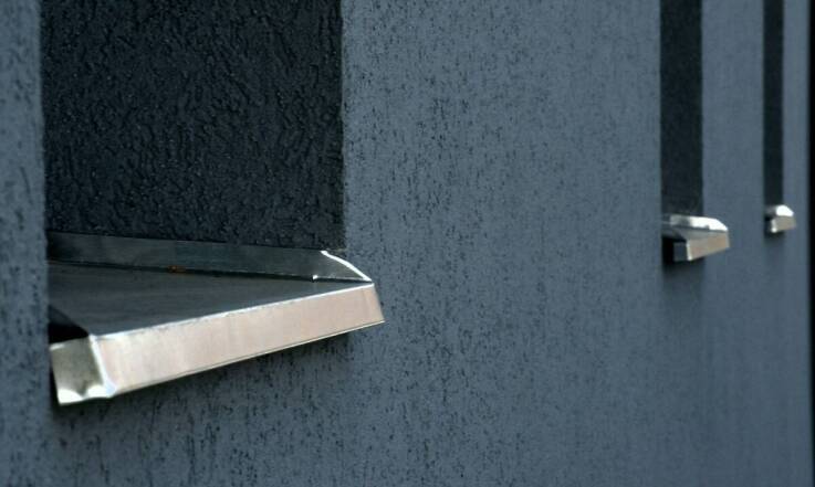 Tynki renowacyjne a estetyka i trwałość elewacji