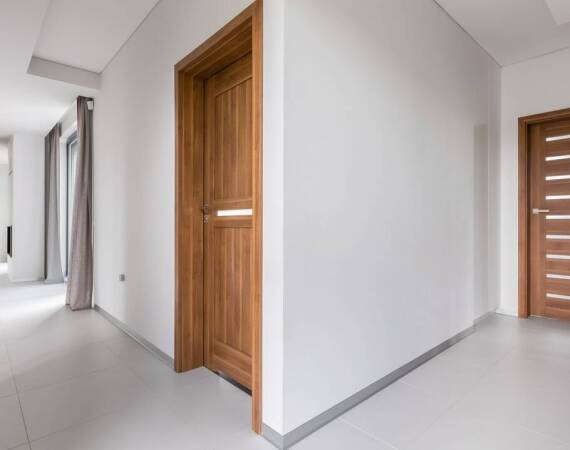 Drzwi wewnętrzne a wpływ na estetykę i funkcjonalność wnętrza