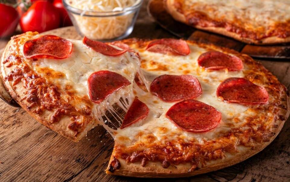 Pizza z łódzkiej pizzerii – jak wybrać idealną kompozycję składników?