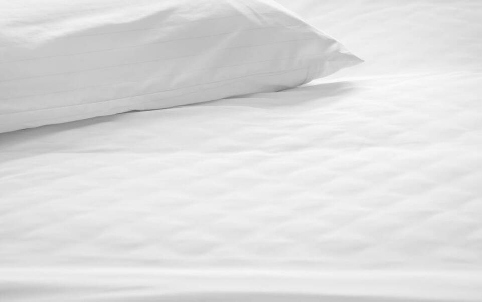 Jak dbałość o detale, takie jak haft, wpływa na doświadczenie hotelowych gości?
