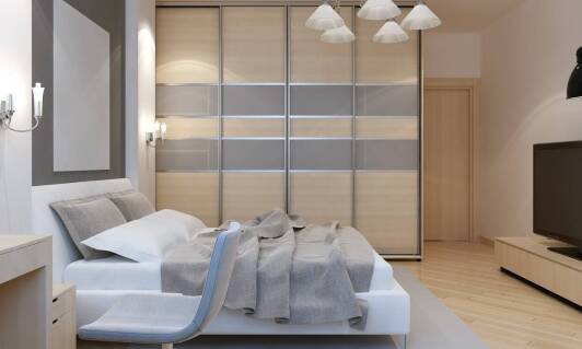 Porównanie różnych typów systemów przesuwnych drzwi do szaf