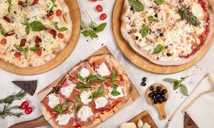 Jak rozpoznać trzy style pizzy spotykane w Łodzi i czego po nich oczekiwać